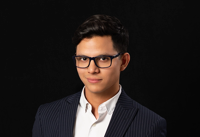 A headshot of Christian Gandara, a professional photographer in Dallas